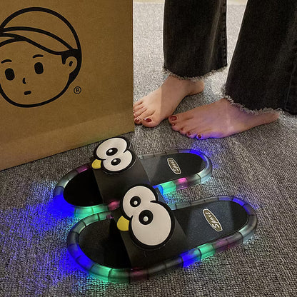 Cute slippers with cartoon motifs that glow